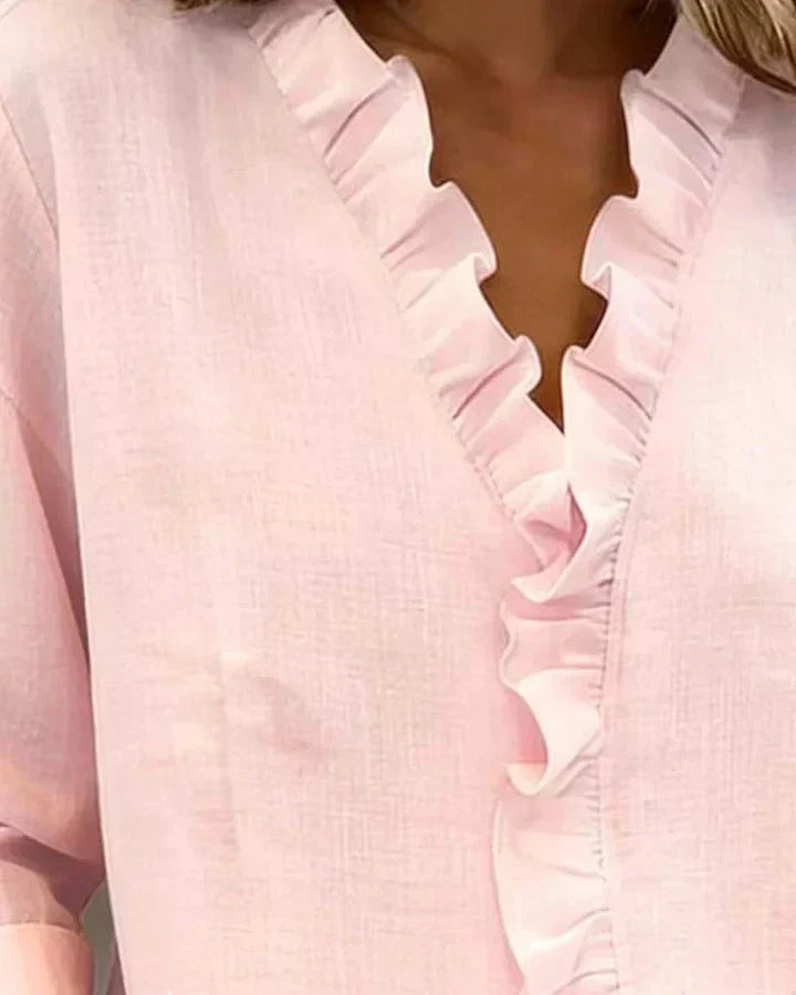 Amora | Blouse à volants, col en V et manches longues