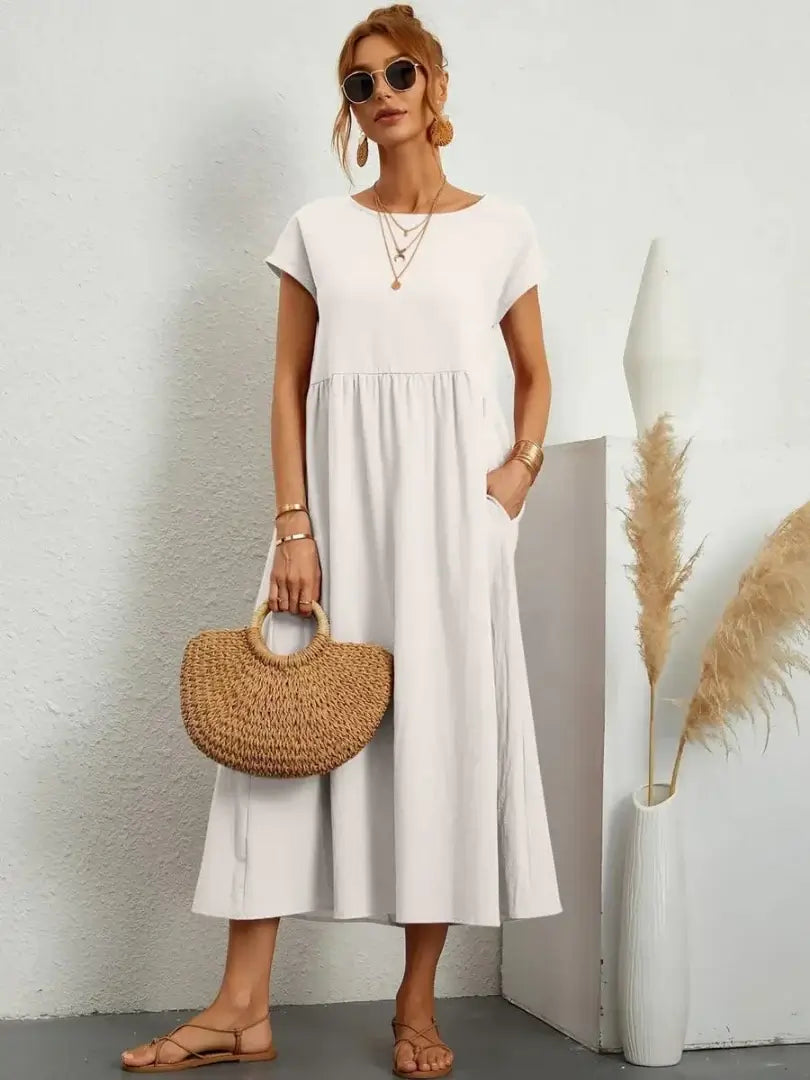 Celine | Robe midi à poches
