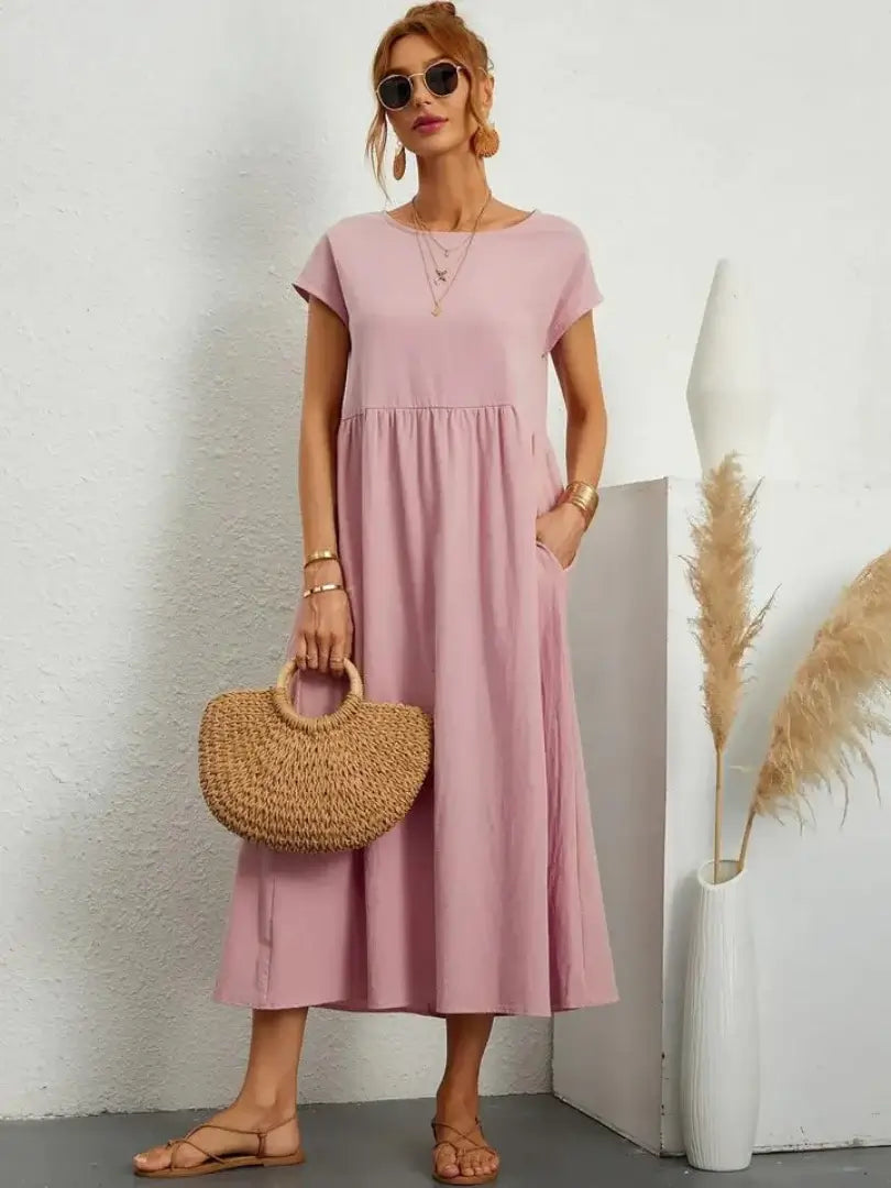 Celine | Robe midi à poches