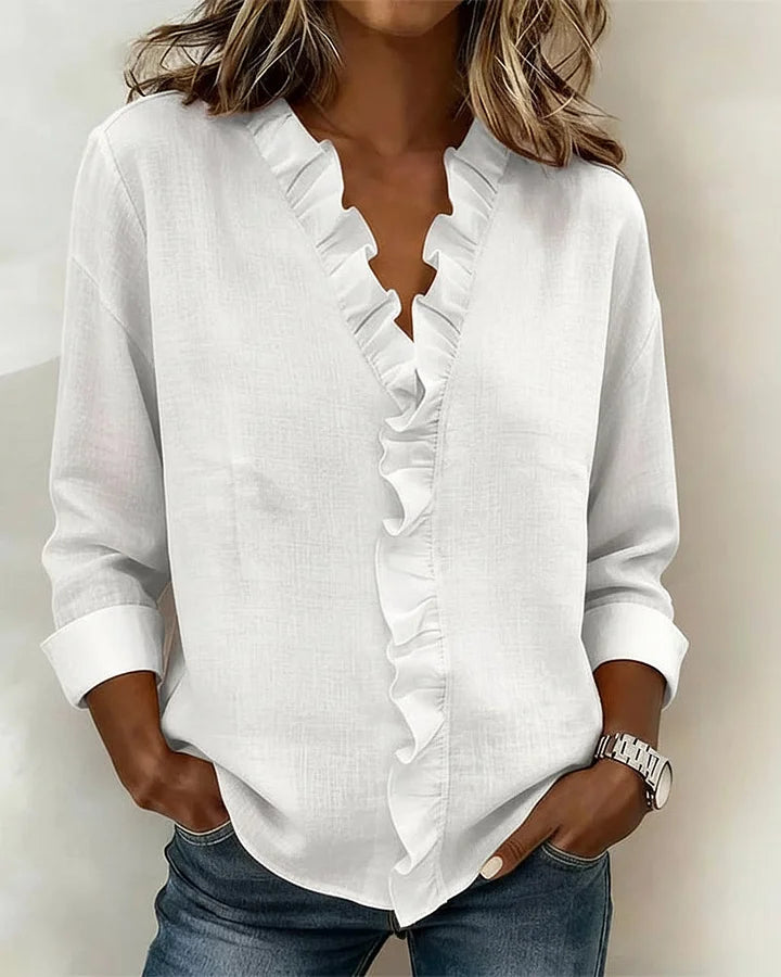 Amora | Blouse à volants, col en V et manches longues