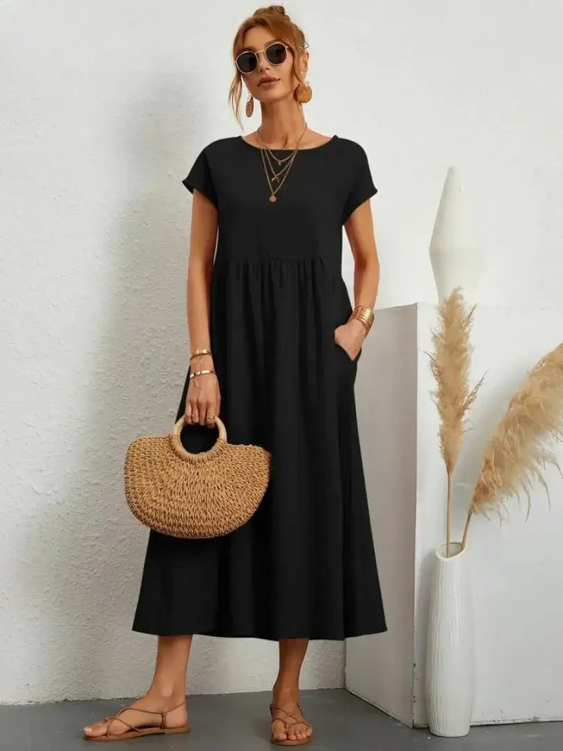 Celine | Robe midi à poches