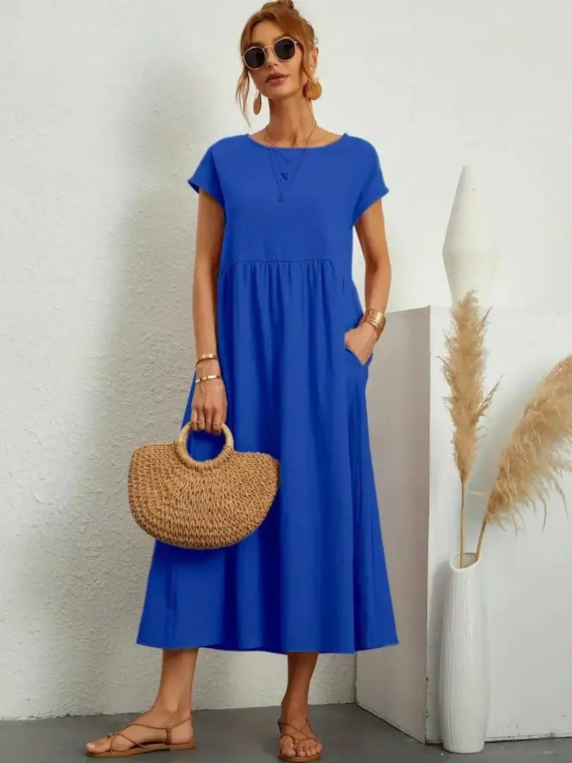 Celine | Robe midi à poches
