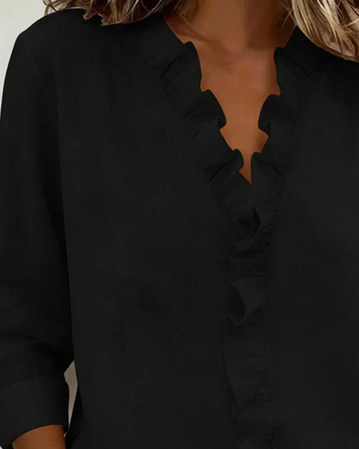 Amora | Blouse à volants, col en V et manches longues